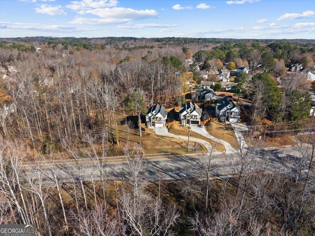 Photo of 658 Rockbridge Road, Lilburn, GA 30047 (MLS # 10693472)