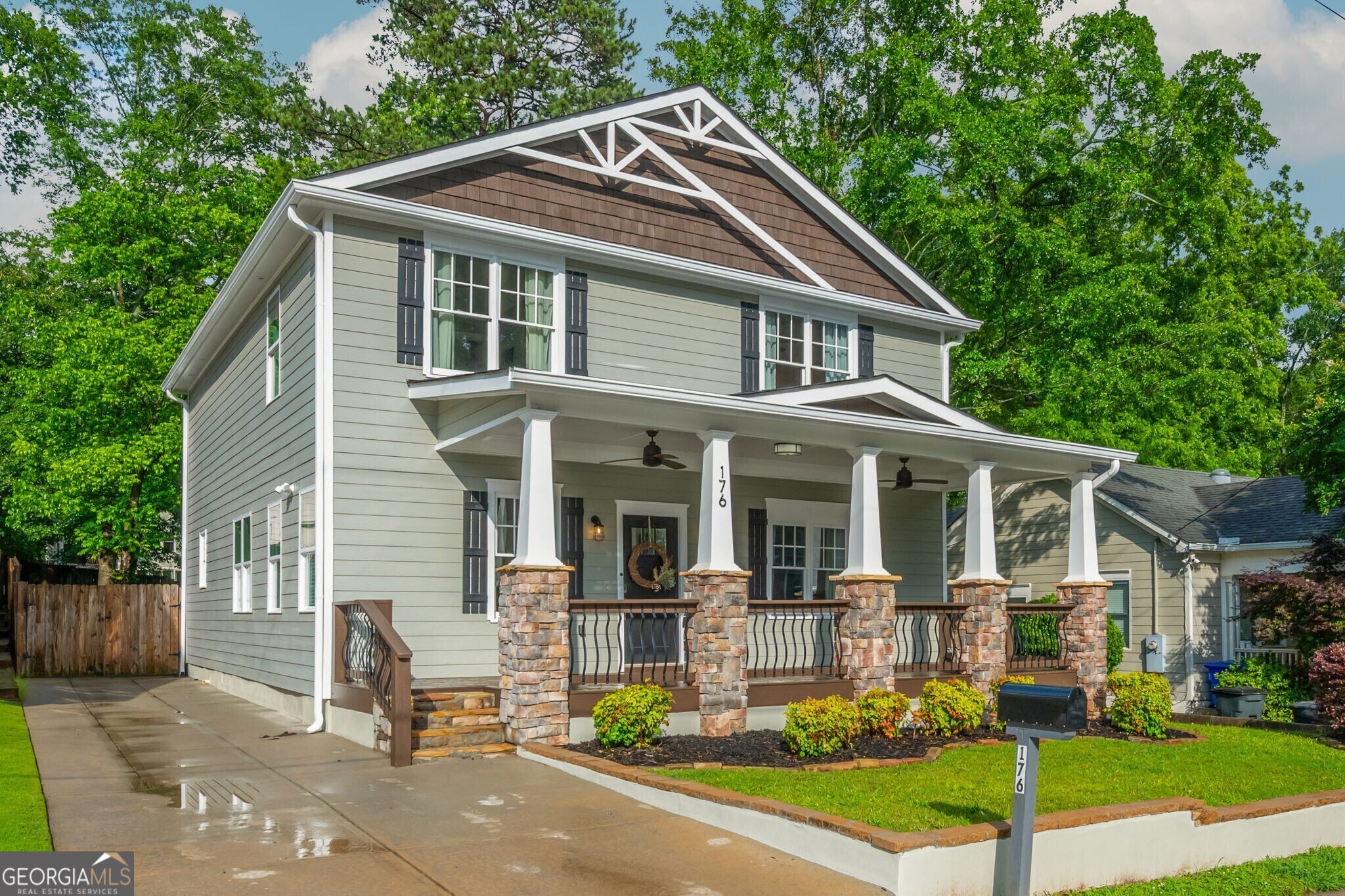 Imagine stepping into the perfect turn-key home, just steps from award-winning schools, fantastic restaurants, charming shops, and vibrant parks. Look no further than 176 Olympic Place, nestled in the heart of the City of Decatur's iconic Oakhurst neighborhood. This exceptional property, rebuilt from the ground up in 2016, sits on a lovely lot with an expansive backyard - offering ample space for a future pool or a detached garage. Inside, you'll love the open-concept living space, complete with a convenient bedroom on the main level. There's also a versatile sitting room, ideal for a home office, playroom, or an additional living area. Upstairs, you'll find three more spacious bedrooms, including an oversized primary suite with serene views of the large backyard. The en-suite bathroom boasts beautiful finishes, a walk-in shower, and a massive, built-out closet with separate sections for ultimate organization. Olympic Place is more than just a street; it's a close-knit community with a dedicated walking path to Oakhurst Village and Oakhurst Elementary. Perfectly situated between the lively Oakhurst Village and bustling downtown Decatur, this home offers the absolute best of City of Decatur living.