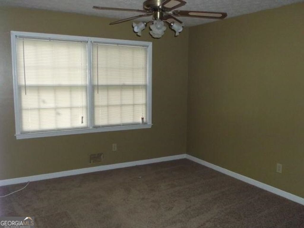 Photo of 1950 Morris Drive, Riverdale, GA 30296 (MLS # 10663777)