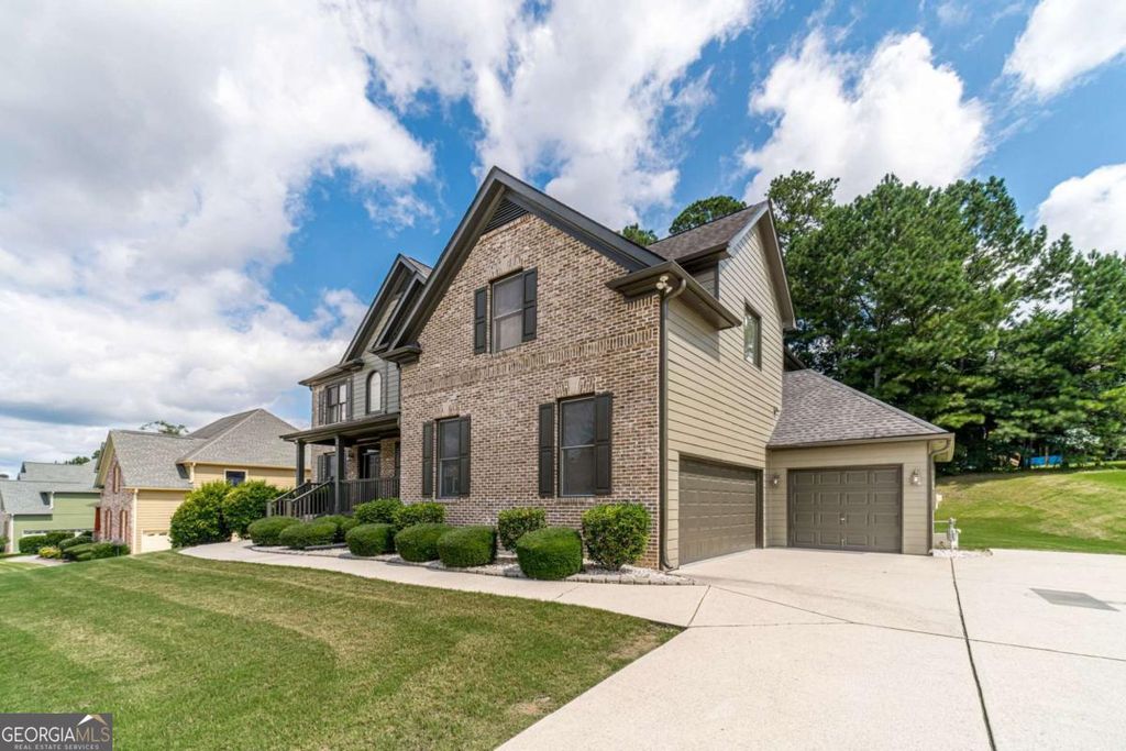 Photo of 1859 Alcovy Shoals Bluff, Lawrenceville, GA 30045 (MLS # 10672211)