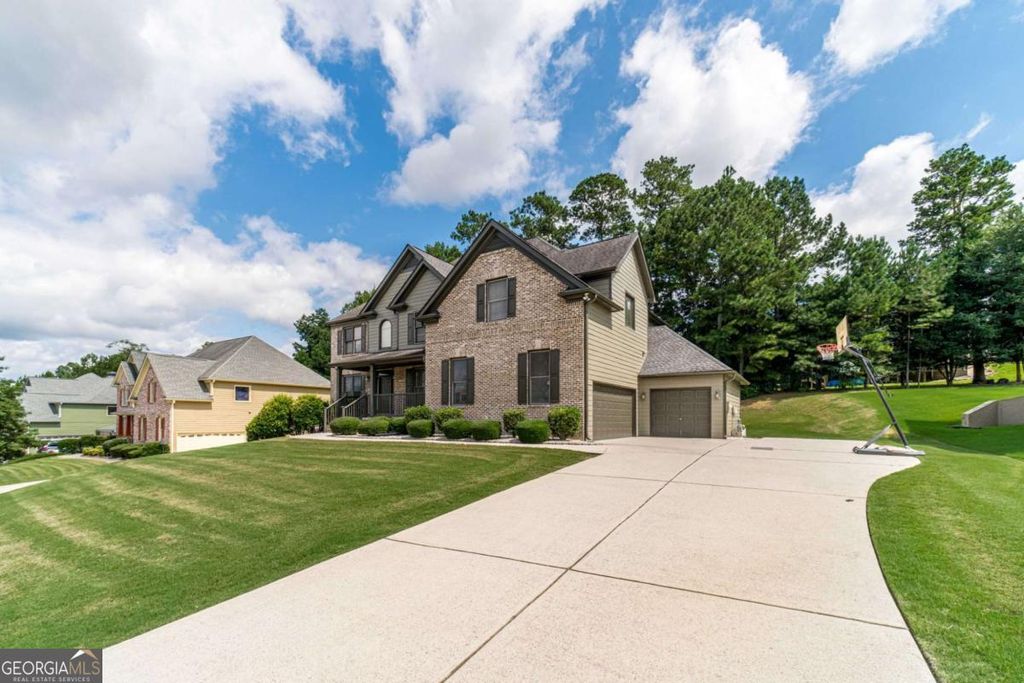 Photo of 1859 Alcovy Shoals Bluff, Lawrenceville, GA 30045 (MLS # 10672211)