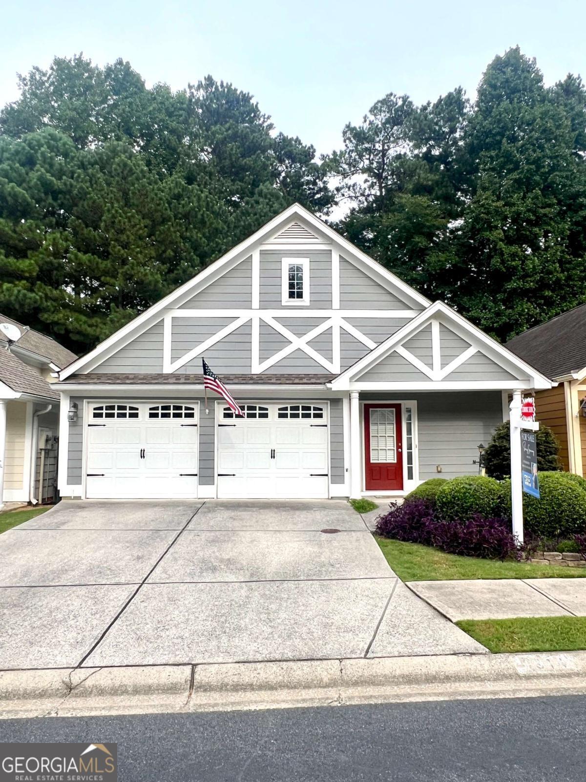 Charming 2-bedroom ranch cottage in the gated Acworth Magnolia Cottage community. This home offers comfort and convenience, located in a peaceful one street neighborhood. The oversized master suite features a vaulted bedroom ceiling and a spacious bath. The 2nd bedroom would be a great office or guest suite. Enjoy your private side patio for morning coffee or quiet evenings. A two-car garage adds storage. This is an ideal retreat for those seeking a simple, secure, and welcoming place to call home. One mile to downtown Acworth, parks, and shopping. While not age-restricted, this community offers the ease of maintenance-free living-HOA dues include lawn care & trash service.