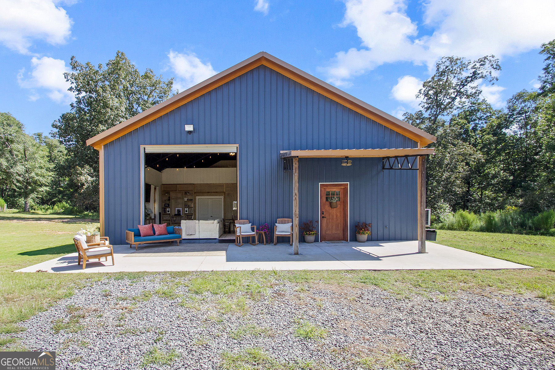 So much to love about this unique property! Bring the indoors out and the outdoors in with this spacious open floor plan Barndo. Special features are the 23x17 Covered back Patio, 39 x13 Front Patio, cathedral ceilings in the Living, Dining and Kitchen areas. 33x18 Wired Workshop with Internet. Lengthy frontage on Town creek that meanders through the property. Open pasture and woods for your pleasure.