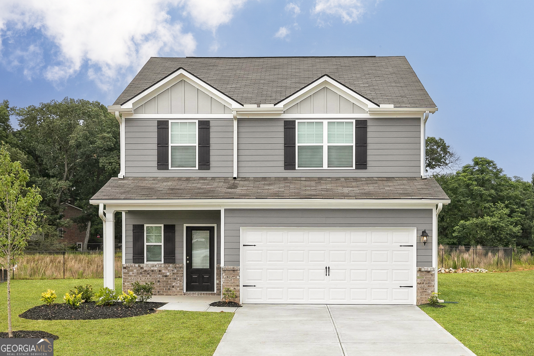 The Camden offers 4 bedrooms, 2.5 baths, and an open-concept design with a chef-ready kitchen featuring granite countertops, island, pantry, and stainless appliances. The spacious family room and private owner's suite with walk-in closet provide comfort and style. Community amenities include a clubhouse, splash pad, playgrounds, basketball courts, and shaded picnic areas.