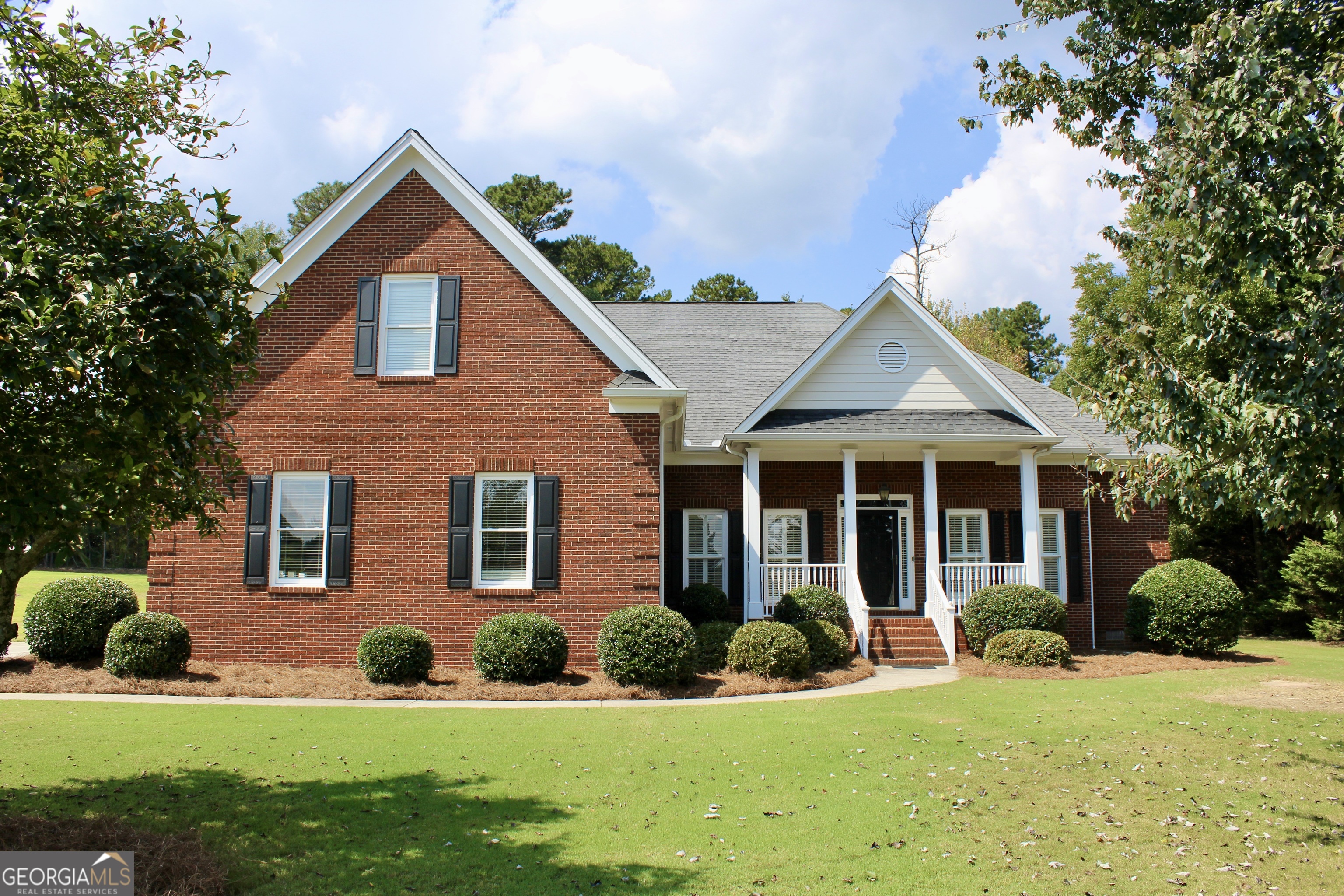Space galore in this well maintained 4 bedroom, 3 1/2 bathroom home located in a beautiful established subdivision with large lots and a tennis court as an added bonus. For outdoor enthusiasts, Fort Yargo State Park is just minutes away. Features of this lovely 3 sided brick home include: Rocking chair front porch, foyer entrance, separate sining room to seat 12, parlor/office, family room with fireplace and high ceilings, nice kitchen with tile backsplash, solid surface counters, stainless steel appliances, breakfast area, 2 pantries, 1/2 bath for guests, hardwood floors, custom shutters and deluxe trim. Large primary bedroom with lots of natural light, primary bath with jetted tub, large shower, double vanities and walk-in closet. Split bedroom plan. Secondary bedrooms share jack & Jill bath. Additional bedroom/bathroom upstairs, plus huge attic space. Outside space open to a level backyard with deck.
