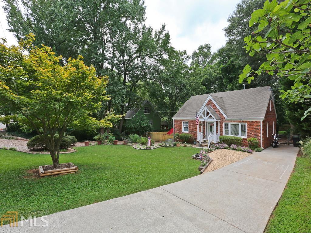 Huge 4bd, 2bth bungalow home in sought after Forest Hills! Features include-Beautiful hardwoods throughout, Brand new remodeled kitchen w/ GRANITE countertops, gas stove, new cabinets & SS appliances, dual vanity in master bath, Architectural roof, newly installed double pane vinyl windows, basement w/ exterior entrance, huge fenced in backyard, beautiful landscaped front yard, patio to entertain friends on, and much more. Zoned for the Museum School! Too many wonderful features to list! Must see-will sell fast! Convenient to Atlanta, Emory, and CDC.