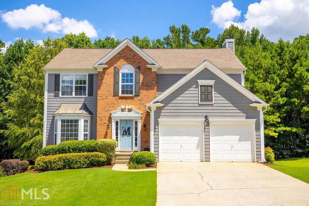 FULLY REMODELED BEAUTY ON FINISHED BASEMENT! Likely one of the best lots in Heritage Club-backing to private woods, fire pit and HUGE flat/fenced yard! Oversized deck with built in storage, grilling station and extended patio coming off the terrace level. Gleaming newer hardwoods on main level, soaring 2 story foyer with grand staircase and separate formal living room. Stunning dining room with custom built coffered ceiling and plenty of room for large gatherings. Cozy fireside living room with open concept views all the way to the kitchen.