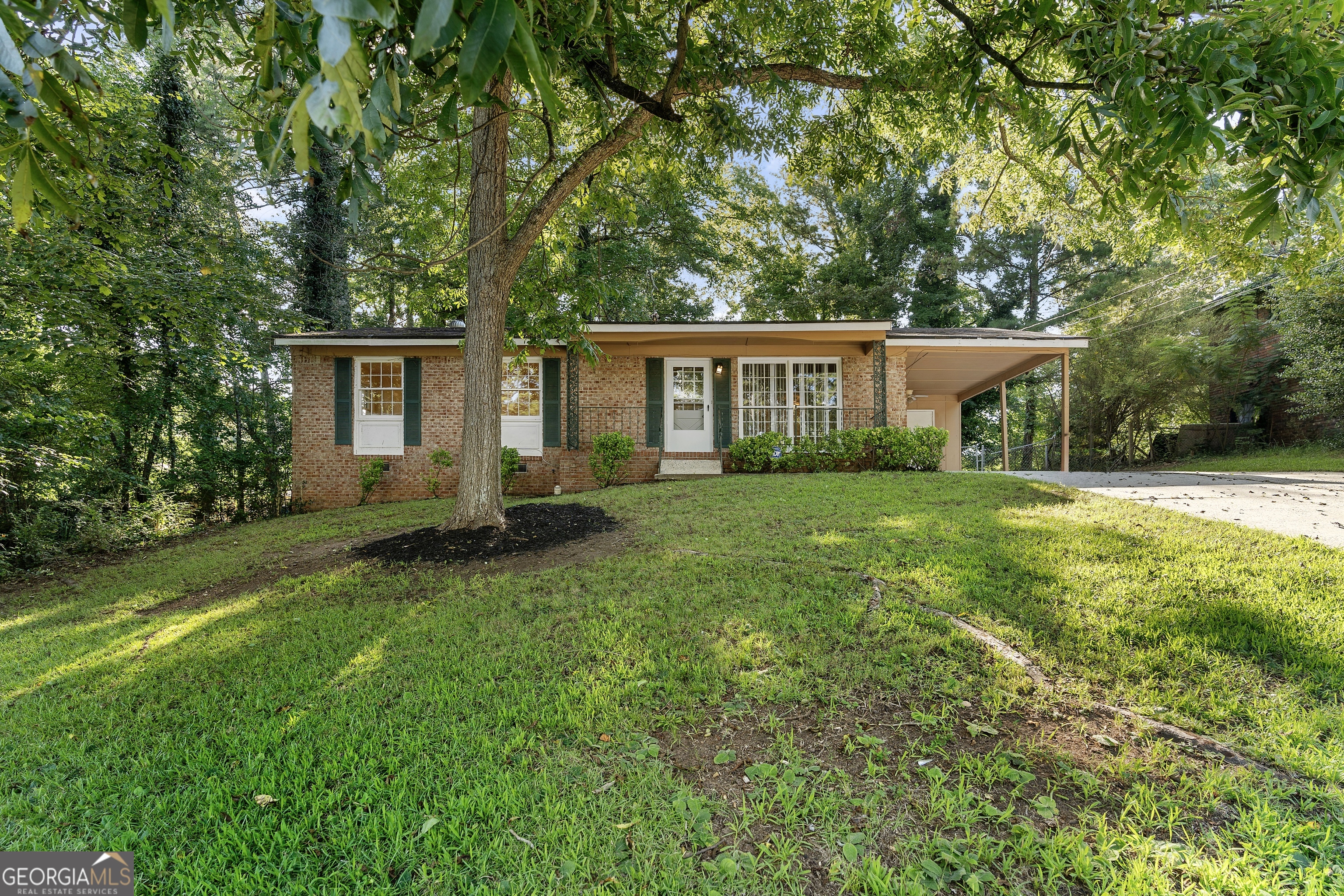 Fantastic 3-bedroom, 1.5-bath home just minutes from the airport. This home is located on a quiet street only 5 minutes from Hartsfield-Jackson Airport and offers easy access to both Interstates 285 and 85. The large living area features beautiful hardwood floors. The all-white kitchen opens to a private, fenced backyard. This is a great home or investment rental opportunity, especially for those working at the Atlanta airport.