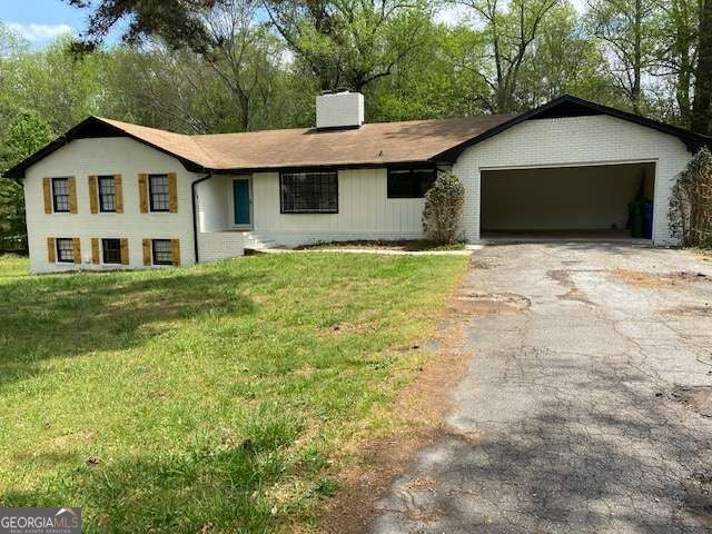 Photo of 716 Scenic Highway, Lawrenceville, GA 30046 (MLS # 10851161)