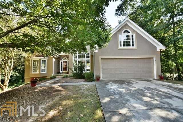 Spacious Ranch home in sought after Peachtree Woods Sub. On full basement with boat door situated on a wooded cul de sac lot. Great open floor plan perfect for entertaining, large new deck, great master suite & nice size bedrooms.