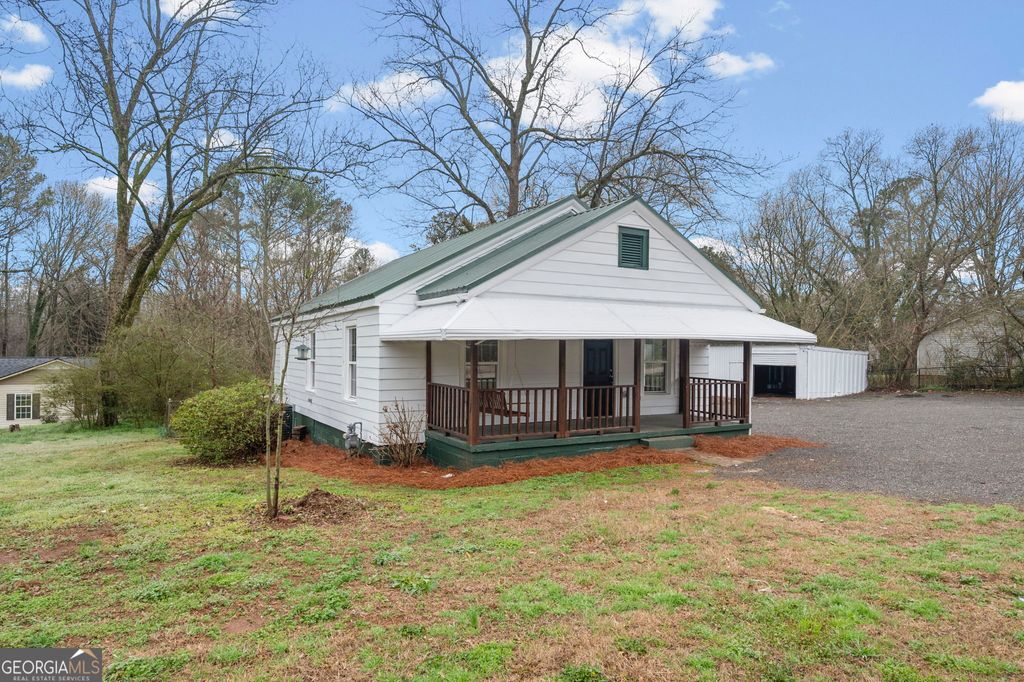 Photo of 802 E McIntosh Road, Griffin, GA 30223 (MLS # 10701679)
