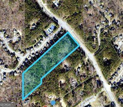 Great piece of development land. Categorized Suburban Living on Cherokee County's Future Use Plan. Established residential neighborhood with potential infill and redevelopment with other listings 30+ acres. Possible sewerage tie on. Next to Blankets Creek Bike Park & Trail.