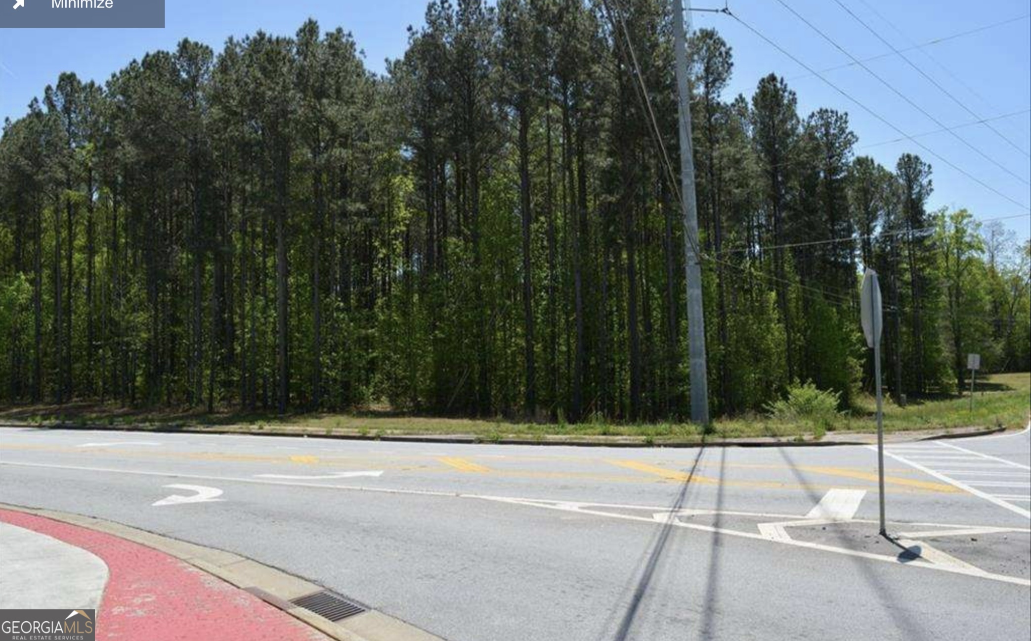 Prime Corner Lot in Highly Desirable Location - Zoned R-30 with Utilities Available Don't miss this rare opportunity to own a magnificent, level, and heavily wooded corner lot in one of the most sought-after areas within the Allatoona High School district. With gentle topography and ideal orientation, this property offers the perfect setting for a private estate or a small enclave of up to three custom homes (30,000 sq. ft. minimum lot size per current R-30 zoning). All essential utilities are available at the property, including water, sewer, natural gas, and high-speed cable internet. Enjoy the convenience of nearby shopping, dining, a movie theater, public golf courses, and quick access to major travel routes and job centers. Outdoor enthusiasts will appreciate the proximity to beautiful Lake Allatoona, offering year-round recreation. A small, family monument is located on the property-an enduring and respectful tribute that adds to the character and heritage of the land. This is a rare chance to create a custom retreat or development in a truly exceptional location. For more information please see Listing to contact Listing Agent