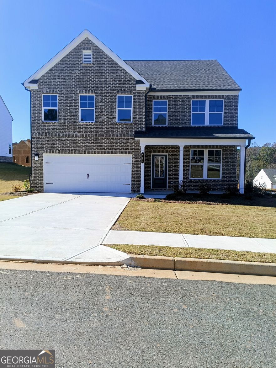 Welcome to Stanley Martin Homes,  you are greeted with the Hollins plan, you can mix and mingle with friends and family in your open-concept first floor, which includes a kitchen overlooking the family room and dining area. A bedroom at the front of the home can be used for guests to have their own private space. The covered front porch or rear patio provide the perfect spot to relax and enjoy your new home. Upstairs, the Primary suite boasts ample space, including a large walk-in closet off the on-suite bathroom with double vanities, walk-in shower and separate soaking tub. Additional bedrooms provide the perfect place for family or friends to rest their heads at night. Plus, take the chore out of doing the laundry with a conveniently located laundry room on the upper level! Some of the SMart Selected design options in this home include a gourmet kitchen & center island, large owner's suite with walk-in closet and on-suite bath, patio, main level bedroom and full bath. Lot 87.River Oaks is perfectly positioned to offer the best of Locust Grove living. With easy access to I-75, you will be minutes from: Tanger Outlets, Historic Downtown Locust Grove, Shopping and dining destinations. The area is also surrounded by popular attractions, including Noah's Ark Animal Sanctuary, High Falls State Park, and the Atlanta Motor Speedway. Photos shown are of a similar home.