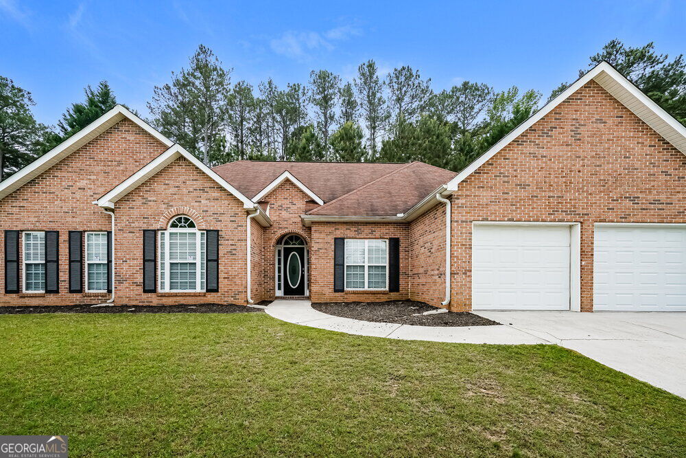Photo of 675 Togwatee Pass, Hampton, GA 30228 (MLS # 10880686)