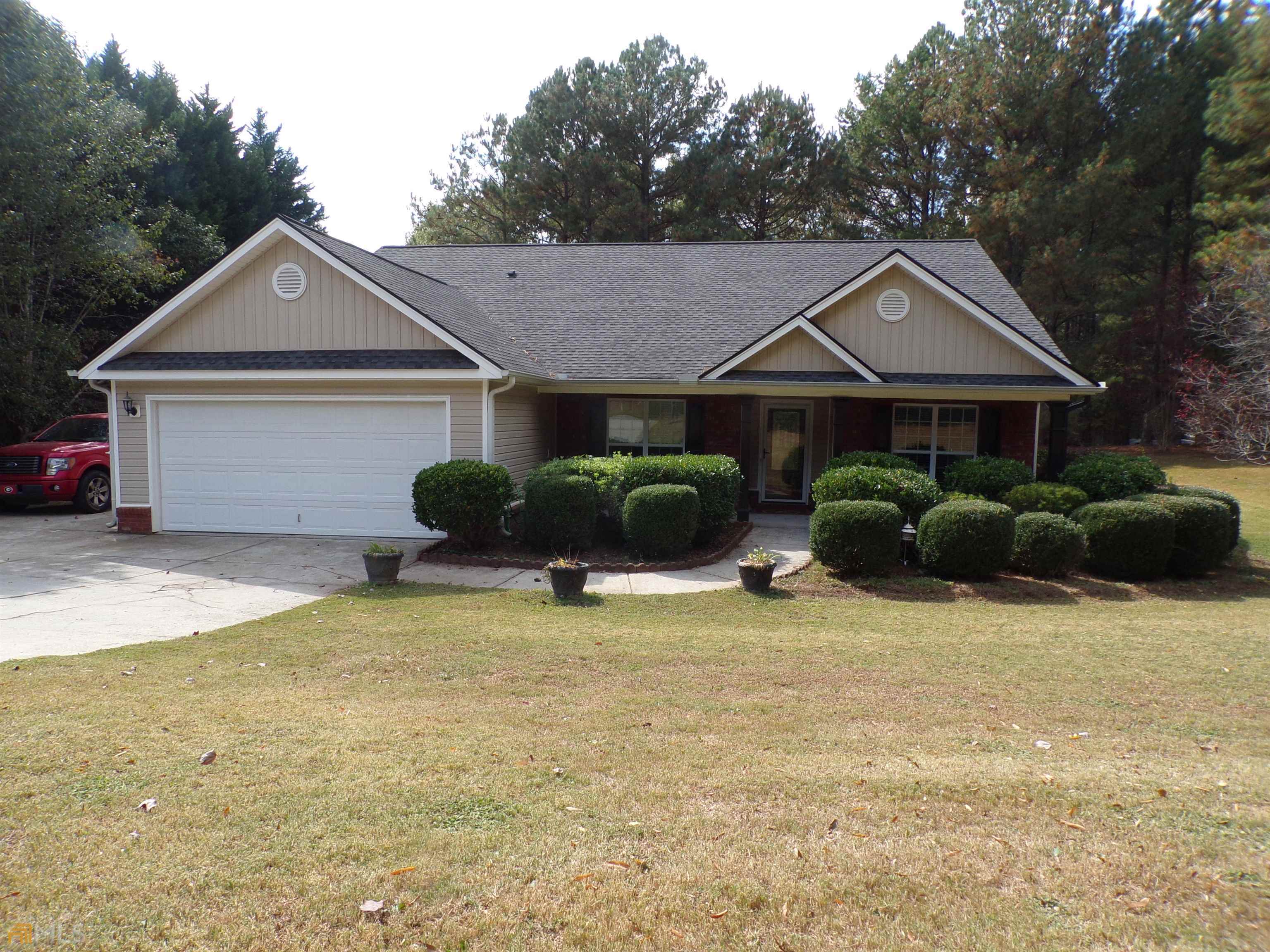 Immaculate Move-in Ready, One story Ranch on a large wooded lot. Nice 16 x 16 outbuilding. Home has many updated features - New stainless appliances, New countertops, New sinks and facuets, New Hardwoods throughout! 3 BR/2 Baths. Private master suite bathroom with Shower, Soaking Tub and large Walk-in Closet. Separate Dining Room. Vaulted Family & Kitchen. Family room has wood burning fireplace with hearth. Qualifies for 100% USDA eligible area.