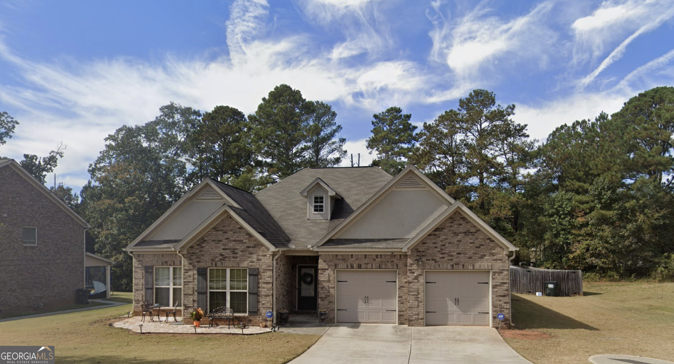Beautiful Home in Sought-After Conyers Neighborhood! Welcome to 1128 Carillon Dr SE - a beautifully maintained 4-bedroom, 3-bath home nestled in a quiet, established community in the heart of Conyers. This inviting residence offers the perfect blend of comfort, style, and convenience, making it ideal for first-time buyers, anyone downsizing, or anyone looking for a peaceful retreat. Step inside to discover a light-filled open floor plan with vaulted ceilings, a cozy fireplace in the living room, and stunning hardwood floors throughout the main living areas. The spacious eat-in kitchen features stainless steel appliances, ample cabinet space, and a breakfast nook perfect for casual dining. The primary suite is a true haven with a walk-in closet and private en-suite bath featuring a soaking tub and separate shower. Three additional bedrooms offer flexibility for guests, a home office, or growing families. Enjoy morning coffee or evening relaxation in the enclosed sunroom or on the extravagant backyard deck overlooking a beautifully landscaped yard - perfect for entertaining or unwinding in nature. The property also includes a two-car garage and a well-kept lawn with mature trees providing shade and curb appeal. Conveniently located just minutes from I-20, shopping, schools, and dining, this home offers suburban tranquility with easy access to everything Conyers has to offer. Don't miss your chance to make this charming house your new home. Agent/Owner