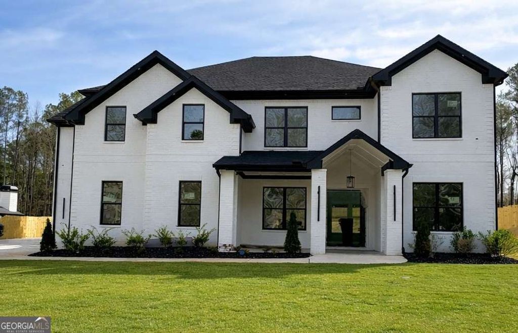 Photo of 2592 Camp Mitchell Road, Grayson, GA 30017 (MLS # 10679984)