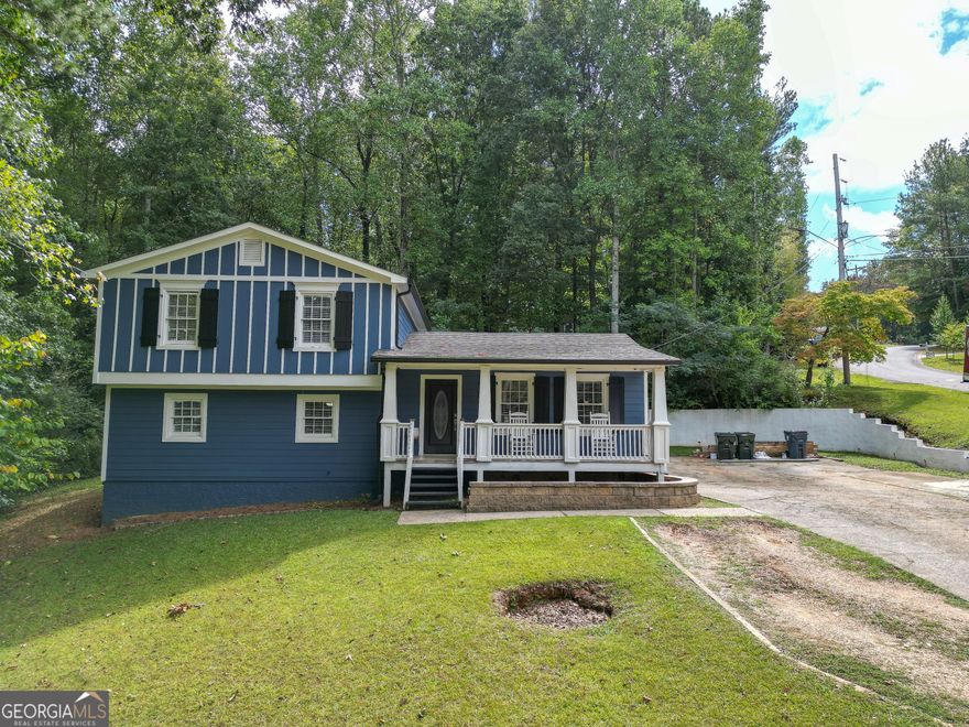 Wonderful  move-in ready, traditional home situated in a corner lot. This 3 beds and 2 baths home blends comfort and functionality. The property offers an open concept with lots of natural light. Full basement great for family room, office room or  entertainment. The rear porch is perfect for sharing with family and friends and provides an inviting outdoor space for relaxation.    Extra storage in patio allows you to keep anything you need to save for later.    No HOA or rental restrictions.    This home is located conveniently to Cobb Hospital and East West Connector shopping and dining.    Schedule your appointment now!