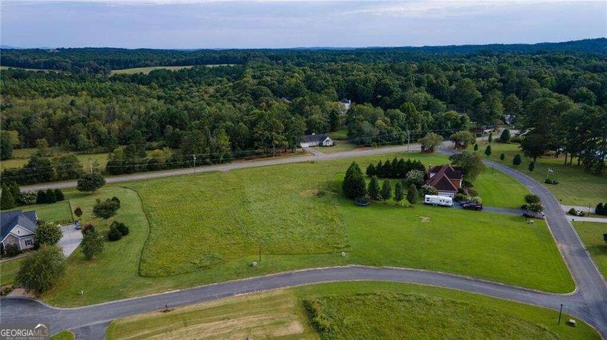 Level .86-acre lot in prestigious Soda Creek Residential Development is a desirable location to build your custom home. This beautiful building site is located near a cul-de-sac with frontage on Telluride Trial and Red Bud Road. Buyer is responsible for a level 3 soil analysis required for a septic permit. Preliminary data indicates an Alternative/Drip Emitter System could be required.