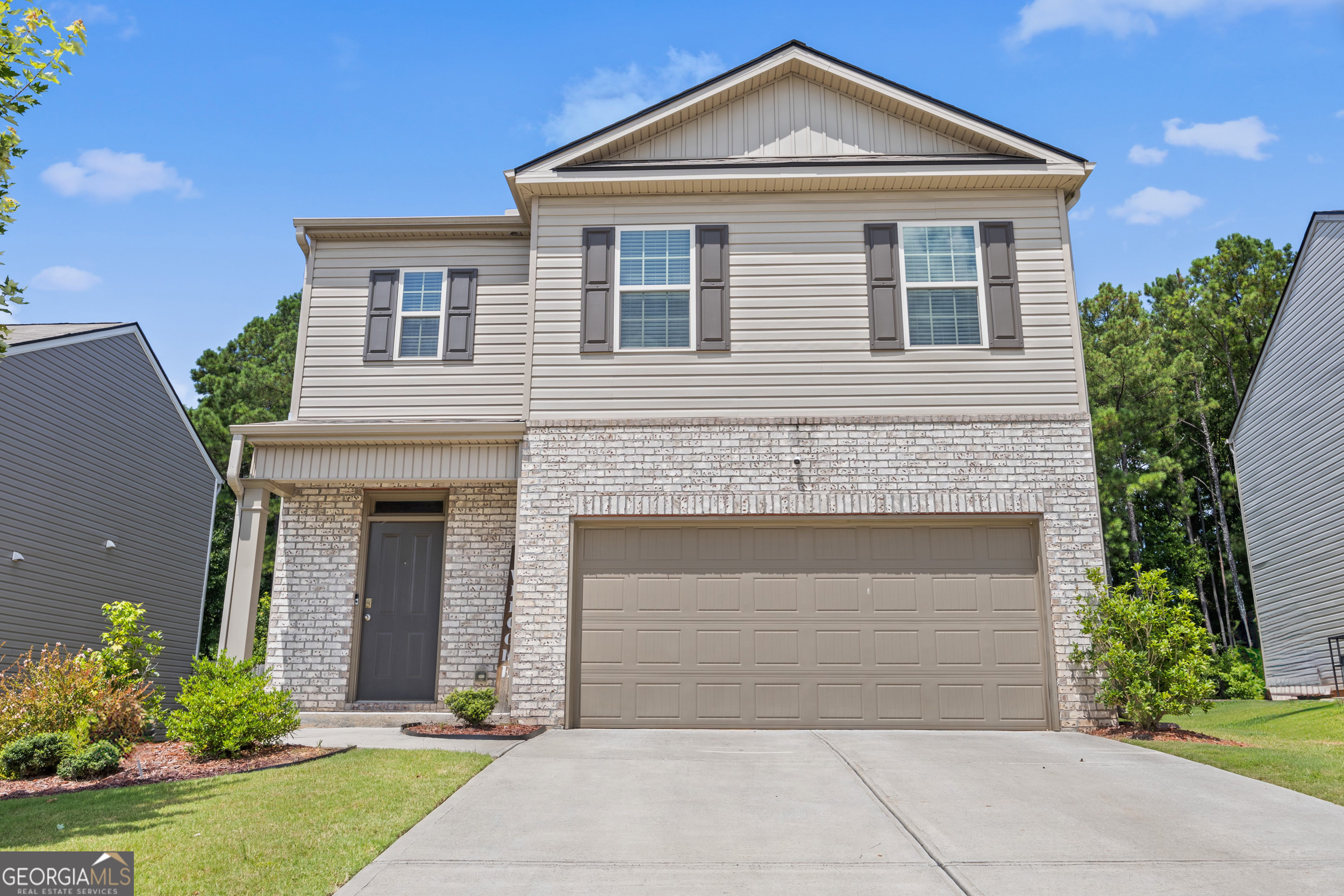 Discover this impressive spacious home tucked away on a peaceful cul-de-sac within the desirable Riggins Ridge community. The versatile layout includes a full bedroom and bathroom on the main level-perfect for guests, a home office, or multi-generational living. The heart of the home is the open-concept main floor, where the modern kitchen shines with granite countertops, stainless steel appliances, and a generous island that overlooks the living and dining spaces-ideal for both everyday life and entertaining. Upstairs, retreat to the oversized primary suite complete with a walk-in closet and private ensuite bathroom. Three additional bedrooms and another full bath provide ample space for your needs. In this home you'll enjoy close access to a range of community amenities, including a swimming pool, tennis court and playgrounds. Located just minutes from Camp Creek Marketplace, Hartsfield-Jackson Airport, and major interstates, this home offers a perfect blend of space, comfort, and convenience.