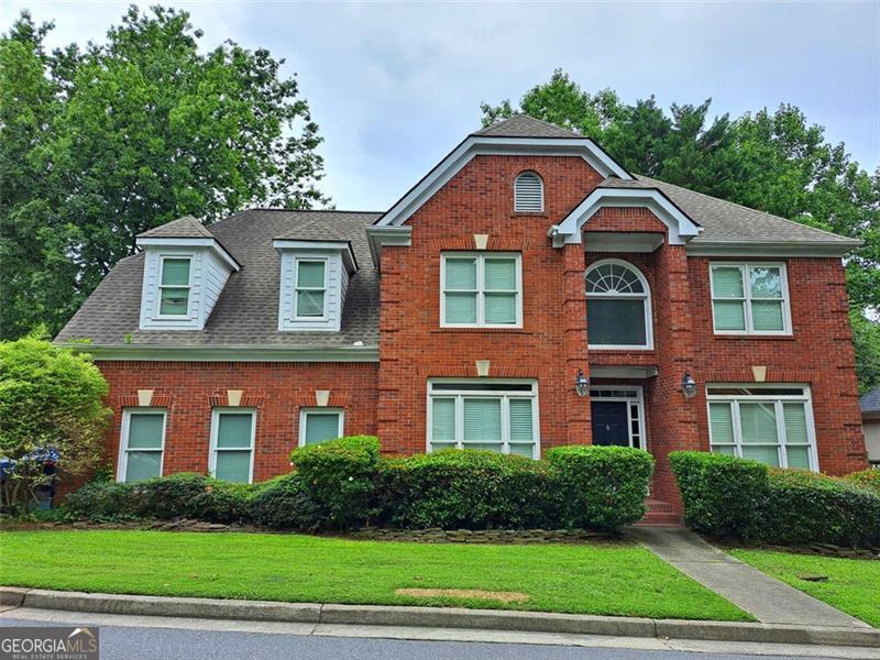 Beautiful brick home nestled in the highly desirable Brookhaven Heights/Lenox Walk Subdivision, on a corner lot on a quiet cul-de-sac. Premier location within reach of the best of Atlanta; easy access to shops, restaurants, parks, public transit, and major roads like 400, 141, Buford Hwy, I85, minutes from the Brookhaven Village shopping and dining district and downtown Buckhead. The home features a large, 2-story foyer with a formal living room/office and dining room, and a large kitchen that opens into the great room with a fireplace. Upper level features an oversized owner's suite with a fireplace and three secondary bedrooms. The finished basement features two bonus rooms, full bath, wet bar, a dining area, and a large entertainment area; perfect for an in-law or au pair suite. Beautiful screened porch overlooks the quiet, fenced backyard.