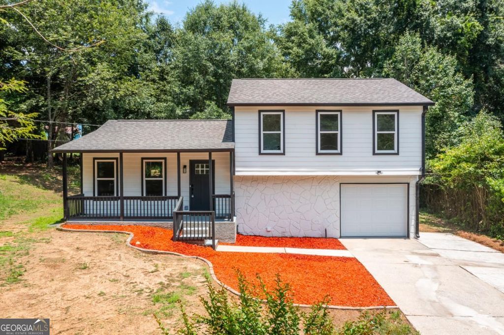 Photo of 847 Half Moon Hollow, Lilburn, GA 30047 (MLS # 10803409)