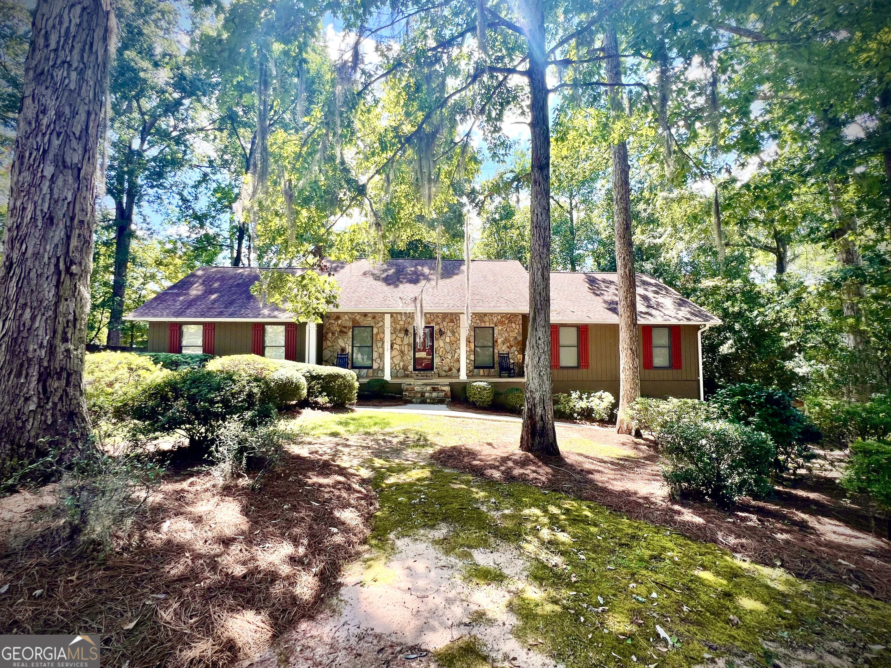 Welcome to this spacious 4-bedroom, 3.5-bath home in the heart of Dublin's desirable White Oak Subdivision. Nestled among majestic white oaks, this cozy home is tucked away in a quiet neighborhood while still minutes from shopping, schools, restaurants, and hospitals. The main level offers 3 bedrooms, 2.5 bathrooms, a kitchen with sunny breakfast area and oak cabinetry, laundry, dining, living, and a versatile flex space-perfect as an office or sitting room. The living room features vaulted ceilings and a fireplace, while ceramic and marble tile add character throughout. The primary suite includes two closets and a private bath with double vanity, garden jacuzzi tub, and separate shower. The fully finished basement (832 sq ft) provides even more living space with new LVP flooring, an additional bedroom, full bath, and French doors leading to a patio-ideal for a media room, game room, or guest suite. Outdoor living is a dream with a spacious screened porch, oversized deck for entertaining, and a large fenced backyard. A partial irrigation system and mature landscaping, highlighted by stunning live oaks, complete the setting. This White Oak home offers space, comfort, and convenience in one of Dublin's most sought-after neighborhoods.