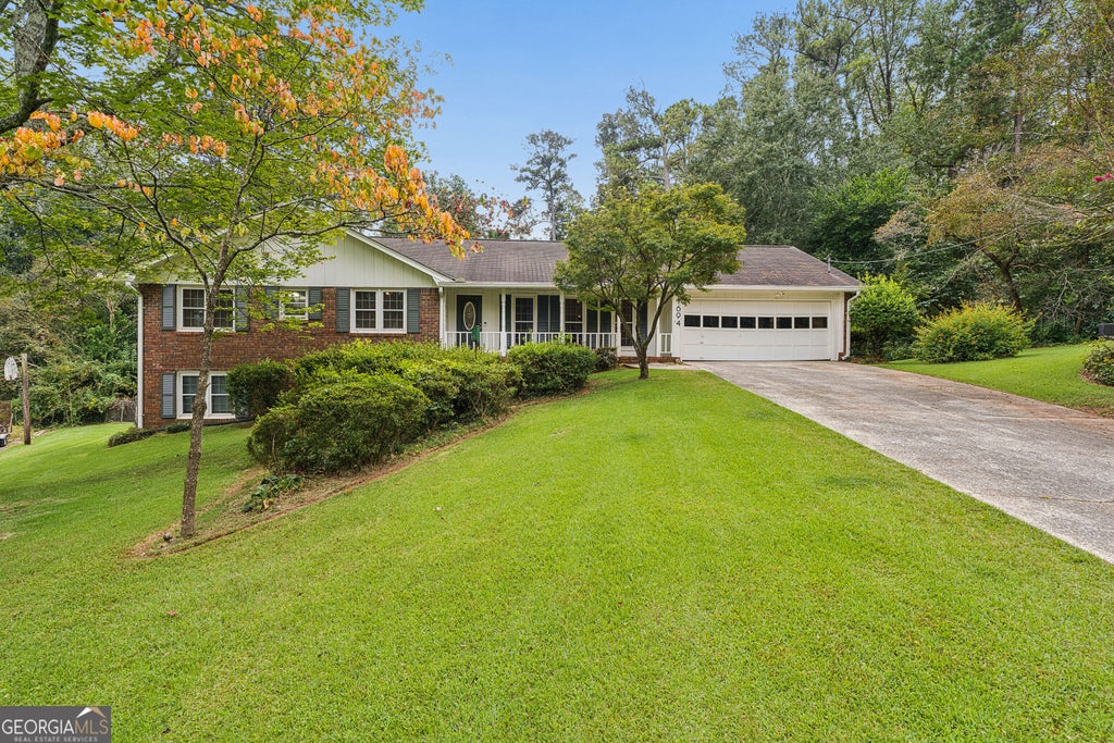 Photo of 1694 Bent River Drive SW, Lilburn, GA 30047 (MLS # 10868452)