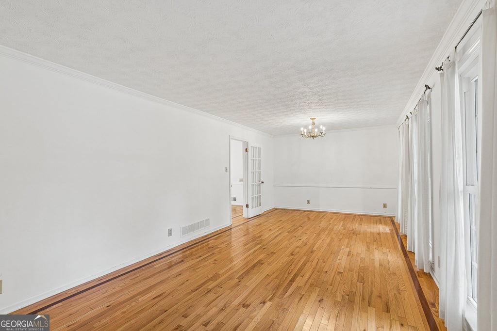 Photo of 1694 Bent River Drive SW, Lilburn, GA 30047 (MLS # 10868452)