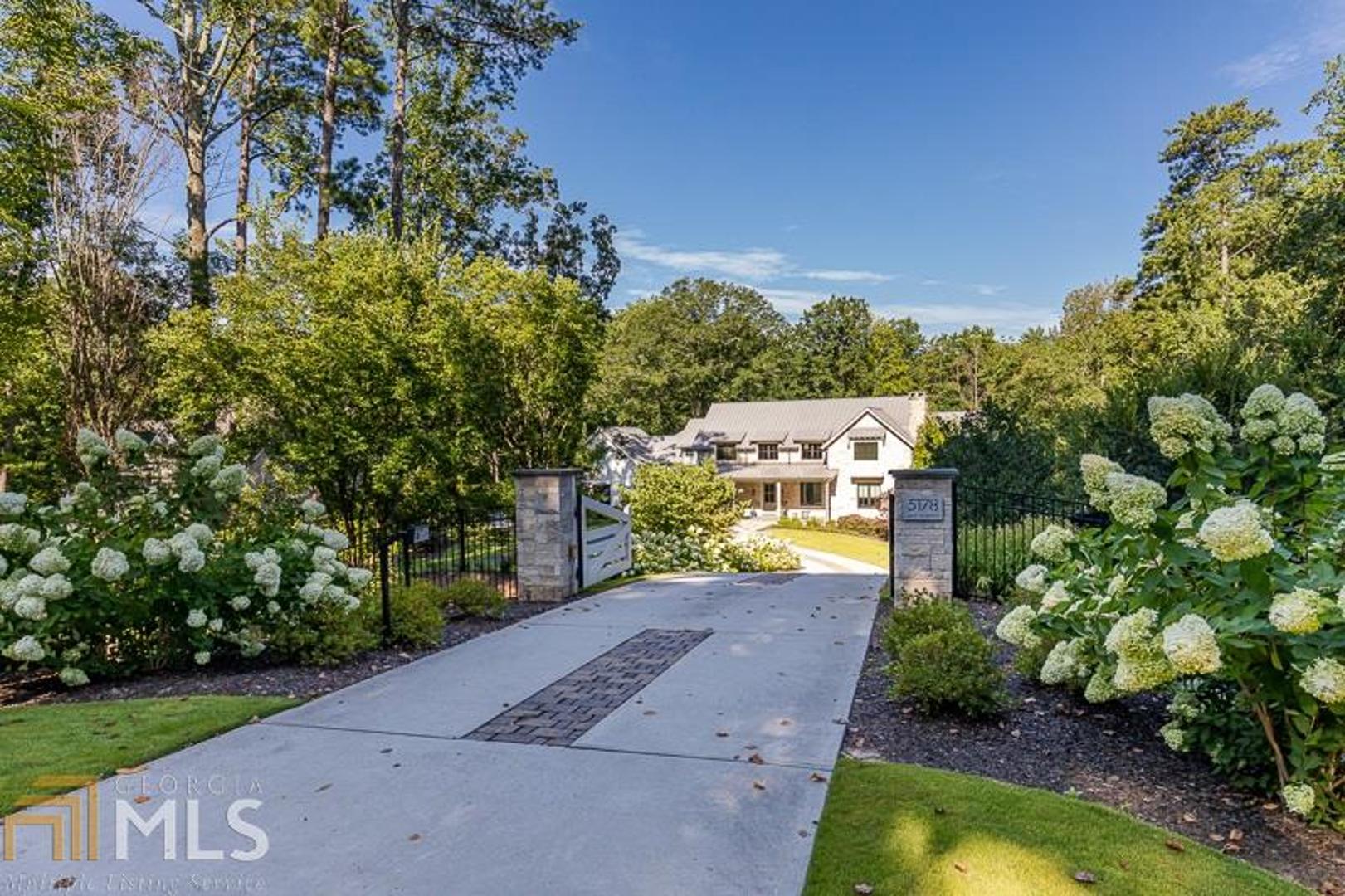 Stunning Custom Harrison Design Home on 2.2 Acres w/ pool, spa & cabana completed in 2016. Resembling a mid-Atlantic farmhouse w/ a chopped buff limestone "main house" & side additions delineated by board-&-batten, the back view of the home is an updated interpretation of the mid-century ranch house including a covered terrace, screened porch & grilling patio that extends the living space through the pool & spa to the extensive manicured grounds & fostering an indoor-outdoor lifestyle. Open floor plan where all daily activities could take place on the ground floor. Plenty of privacy greenery & extended vistas, this house feels like a mountain vacation home. Organic materials used throughout, like oak floors & exposed stained white pine trusses temper the dominance of glass. The Living Rm has a massive, double-sided fireplace in rectangular-pattern limestone separates the living room from the kitchen. The kitchen features a center island w/ a sink & marble waterfall countertop for casual seating adjacent to the open dining area featuring accordion doors out to the porch & terrace. Large pantry serves as a prep area w/ additional appliances & extensive storage. Shiplap cabinets line the space & contrast the open metal shelving marble counters & white cabinetry.  Family room invites relaxation w/ a home entertainment system & built in bar. Owners suite on the main level w/ vaulted ceiling & walk-in closet.  The owners bathroom w/ walk-in shower, tub & vanity, another closet & dressing room. Upstairs boasts 4 Bedrooms & private bathrooms. Finished terrace comprises a rec rm, wine cellar, bath, bedroom, family rm & exercise rm. 4 Car Garage, Elevator Shaft, Smart Home, Salt Water Heated Infinity Pool, Spa & more!