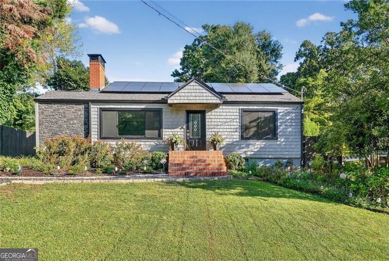 Welcome to this charming and meticulously maintained home in highly desirable Channing Valley-just minutes to I-75, Midtown, and Buckhead. The updated kitchen features stainless steel appliances, a breakfast bar, and a light-filled breakfast area. Refinished hardwood floors flow throughout, complemented by new windows and a new HVAC system for comfort and efficiency. The spacious primary suite offers a double vanity bath, while a separate office provides flexible space for work or study. Step outside to enjoy a private, fully fenced backyard, perfect for entertaining or relaxing. All within walking distance to neighborhood restaurants, shopping, and the park.