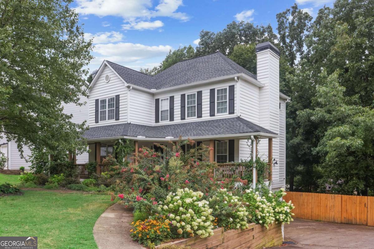 Perfect East Cobb location just a mile from I-75 to deliver you anywhere you want to be in minutes. Who does not love an adorable front porch! This completely renovated home offers so much. Enjoy the evenings watching the hustle of the neighborhood as you sit under your beautiful trees as the sun goes down. The updated kitchen with all white cabinets and top of the line appliances is inviting and perfectly situated to enjoy the beautiful natural backyard where you can enjoy family time on the elevated deck overlooking your fur babies in this completely fenced in backyard. It will become their favorite oasis. The office and open concept living room space will be perfect for those of us that want to stretch out as we enjoy our loved ones in front of the fireplace or sharing timing cooking. The owner's suite with it's oversized shower and walk-in closet are a sight to behold. You will love it. Nothing was overlooked in this renovation including a EV charger in the garage. The basement has become a versatile space for a teen hangout, office, gym, media center or whatever hobby you are looking to enjoy. This lovely home was listed $28,000 below the appraised value as the owners are eager to move on to their next adventure. Instant Equity!