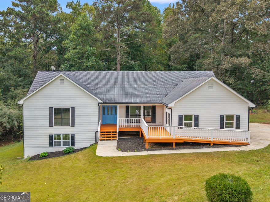 Perfect Location-5.7 Acres-Completely renovated with Basement! Welcome to the private estate you've been waiting for! This 5 bedroom, 3 bath home offers a 6th bonus room and features new floors, paint, countertops, and fixtures! It feels like a brand-new house in one of McDonough's most coveted locations - just minutes from Jodeco Station (Costco, Sprouts, First Watch). This is the perfect blend of secluded country living and city convenience at its best. Don't miss this rare opportunity! Call the listing agent for a tour!