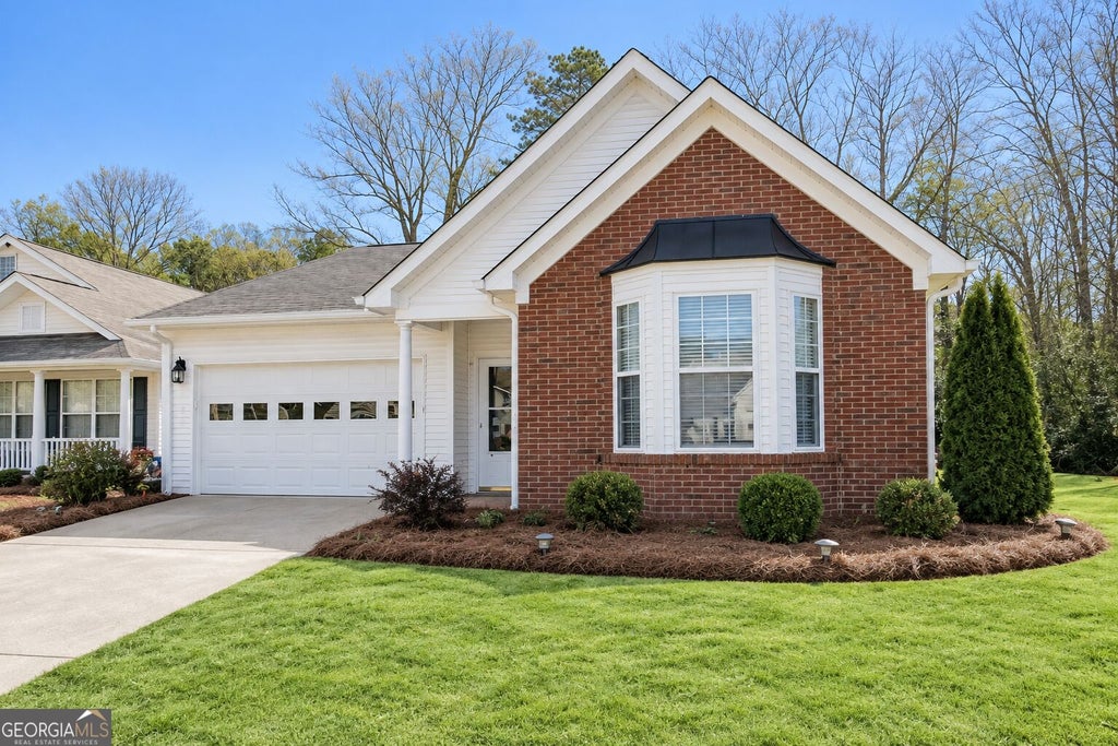 Photo of 310 Singing Brook Lane, McDonough, GA 30253 (MLS # 10841730)