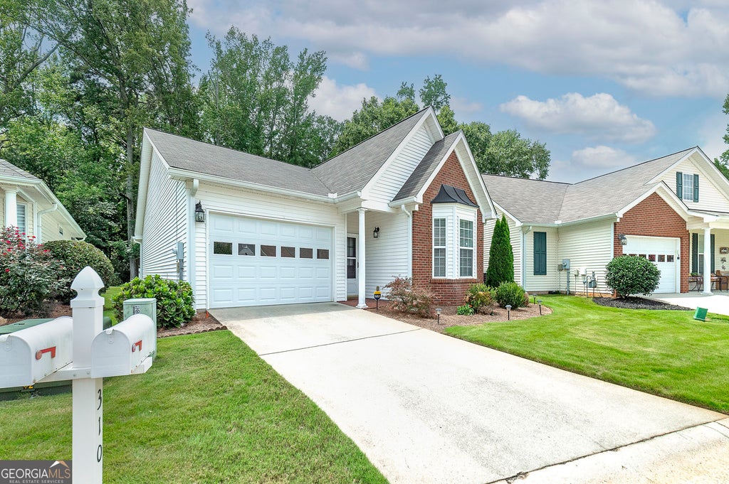 Photo of 310 Singing Brook Lane, McDonough, GA 30253 (MLS # 10841730)