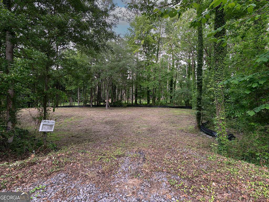 A rare opportunity awaits in prestigious East Cobb on a 1.1 acre build site next to attractive, well stablished residential area and close to top- rated schools. It is a hidden gem that is ready to build one or two homes. This property includes Sanitary sewer easement agreement and survey. No HOA!