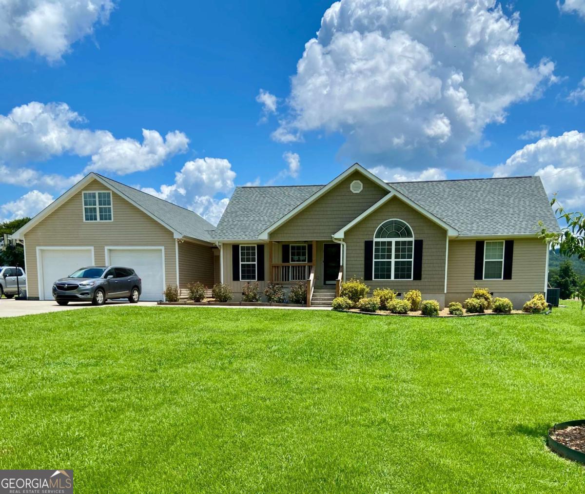 Gorgeous 2992 sq. ft. Home in the country, 3 bedrooms on main floor, 2 bathrooms, large ktchen, living room, 2 bonus rooms, office, hardwood floors, fireplace with gas logs,1260 sq. ft. heated garage. 2024 New roof, 2020 repainted interior walls, 2020 new custom kitchen cabinets, 2022 additional heat/ ac in office, crawl space moisture barrier. Excellent home built in 1994 in an outstanding country location with great neighbors.