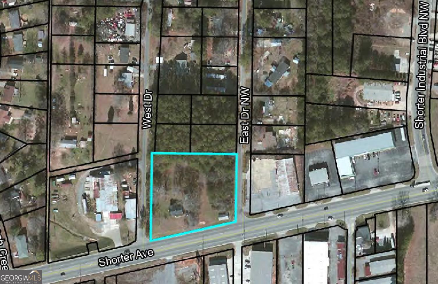 2.00 acre tract located on Shorter Ave which is bordered by East Drive and West Drive. Zoned CC (Community Commercial). Sewer is located on East Dr. Excellent location for a variety of Commercial uses. Approximately 190' of road frontage on Shorter Ave. Buyer to verify zoning and utilities.