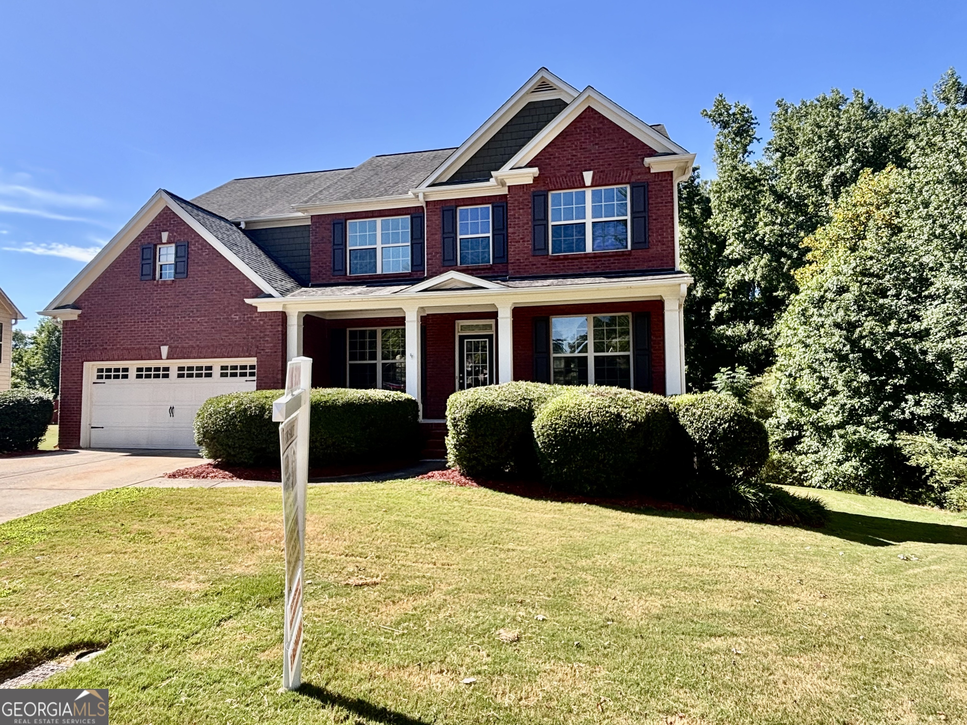 This home is move in ready! Fresh paint inside, new carpet and hardwood, deep cleaned, new deck on back! Two story home on full finished basement with family room, bedroom, full bath, huge storage closets and even room for pool table or play room. Walk out basement door to covered porch and large backyard for kids/pets, room for pool, store a trailer or nice garden or play area. The home is located in Dacula off Fence Rd. Close to Little Mulberry Park, just a mile down road where you can fish, swing, hike, lunch under pavilion or try one of many hiking trails. This park connects back to Mulberry Park off Hog Mountain Rd. Home is also located in a cul de sac with underground utilities and street light. Kitchen has gas range for those who love to cook, granite counter top, stainless steel appliances. Work from home? Great! Office on main level with fiber optic for fast internet and bookshelves, formal dining room, family room with lots of windows and gas log fireplace. Eat in kitchen that leads to new double doors leading to new deck for grilling and chilling. Upstairs the master is very large with a huge sitting area, nursery or exercise/sewing room attached, Master has new large shower, huge soaking tub, separate double vanities and large walk in closet. 3 more nice size bedrooms upstairs with full bathroom. Subdivision offers a book exchange or free book in pavilion near seating and covered gazebo part of the HOA common area close to entrance. Subdivision is about 3.5 miles to I-85/Gravel Springs Exit or a couple miles from Hwy 316 Easy access to Mall of Georgia, fabulous places to eat and play! Roof is 8.5 years old, 3 HVAC units replaced in 2016 when basement completed, Both furnace plenums in attic replaced in 2025, MYQ chamberlin garage door can be open with you phone from anywhere or use remotes. Double car garage is deep enough on one side to hold a second car or long SUV/golf cart. It's like having a three car garage. Call for a tour of survey of property