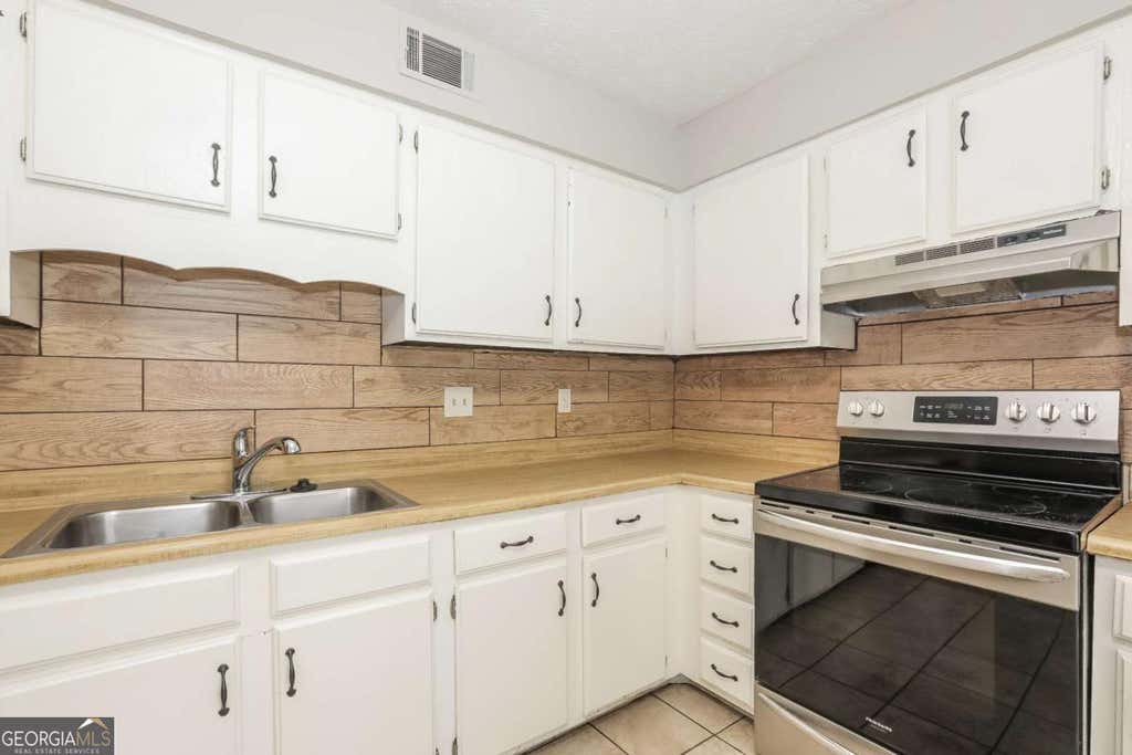 Photo of 442 Sherwood Oaks Road, Stone Mountain, GA 30087 (MLS # 10814021)