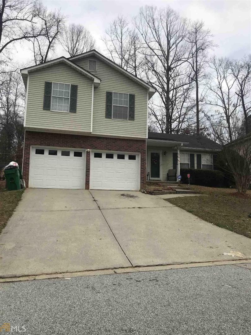 Well maintained home located in Lithonia, GA. Great starter home or Investment property. (3) Bedrooms upstairs, (2) Full Baths upstairs, (1) 1/2 Bath in Keeping Room off the kitchen, separate Living Room and Dining Room, 2 Car Garage, Fenced in backyard for your pets and outdoor entertaining.