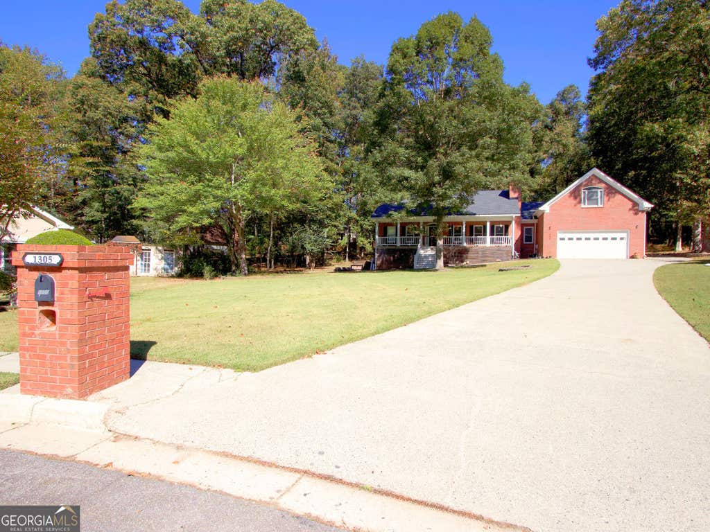 Photo of 1305 Fontainebleau Court NE, Lawrenceville, GA 30043 (MLS # 10798259)