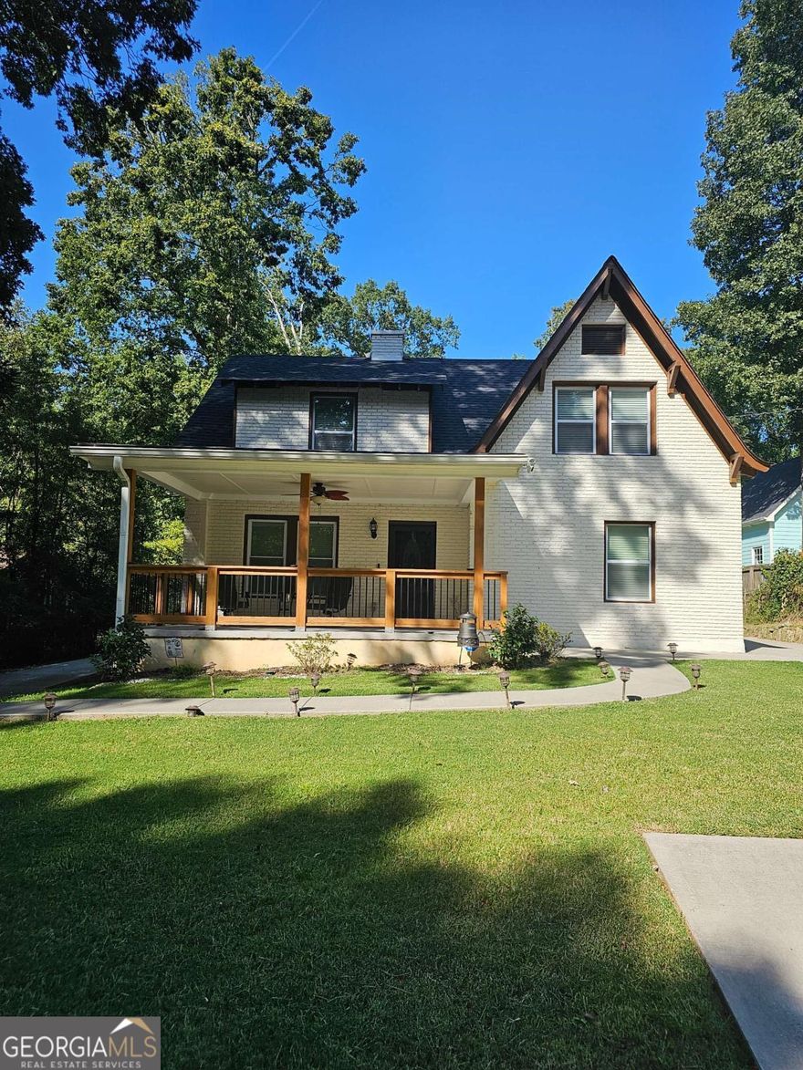 Check out this Beautiful Gem nestled on a private lot with a rocking chair front porch. Home has been Renovated! Master on the main. Beautiful hardwood floors on main level. Harwood is extended up the wide staircase leading to a huge loft with additional hardwood flooring and recess lights for entertaining. Livingroom has a beautiful fireplace. Kitchen has gorgeous granite countertops that accent the cabinets, SS appliances and the breakfast bar area. Kitchen opens up to the dining room with an elegant chandelier. Master Bedroom with huge walk-in closets. Master bath has a beautiful sit in shower.  Private backyard  with new privacy fence. Patio has a fire pit for entertaining. A must see!  Location! Location ! Location! Only 2.7 miles from the Marietta Square and 3.6 from the Smyrna Market Village.