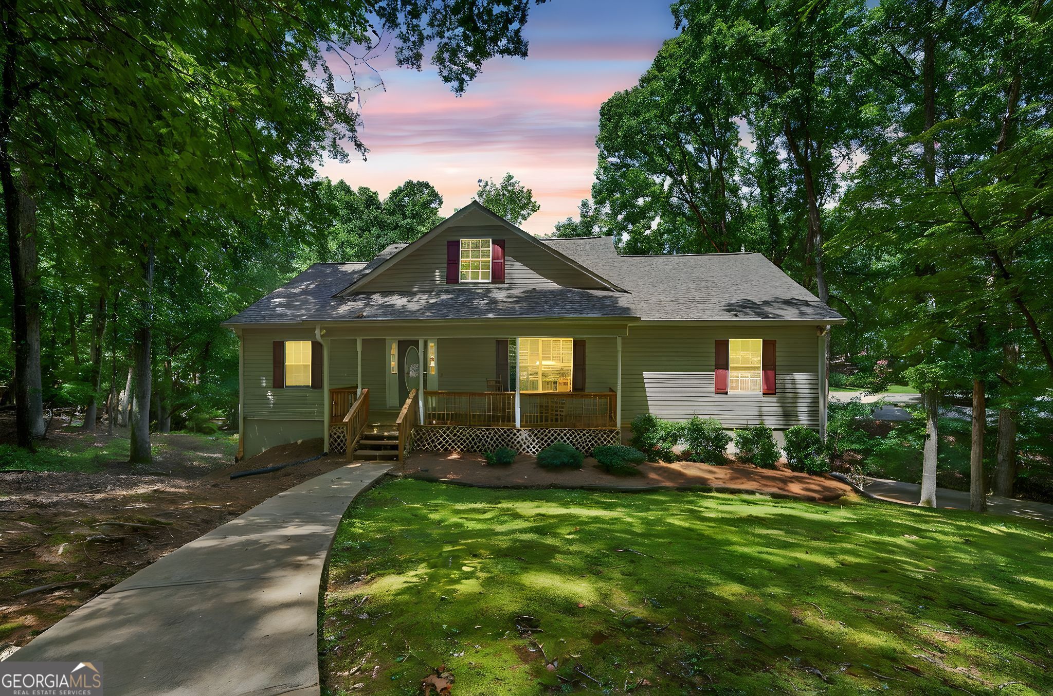 REMODELED LAKE OCONEE LAKE HOME PRIVATE RETREAT! One-of-a-kind lakefront property on a 1+ acres with private dock, beautiful lake views down a serene cove, and large party house by the lake. Wooded lot with circular driveway leads to an inviting covered front porch and ample parking. The JUST-RENOVATED home features LVP flooring, vaulted tongue-groove living room with fireplace, open floor plan, kitchen with quartz countertops, stainless steel appliances, master bedroom with lake view and luxurious bath, and 2 additional bedrooms on the main. Finished walk-out terrace level with large family room, bedroom with lake view, bunk room, and bath. Step outside to the party house with large entertainment area, second kitchen, and bath. There is also a sandy beach area and fire pit near the dock. WONDERFUL LAKE HOME on the beautiful south side of Lake Oconee!