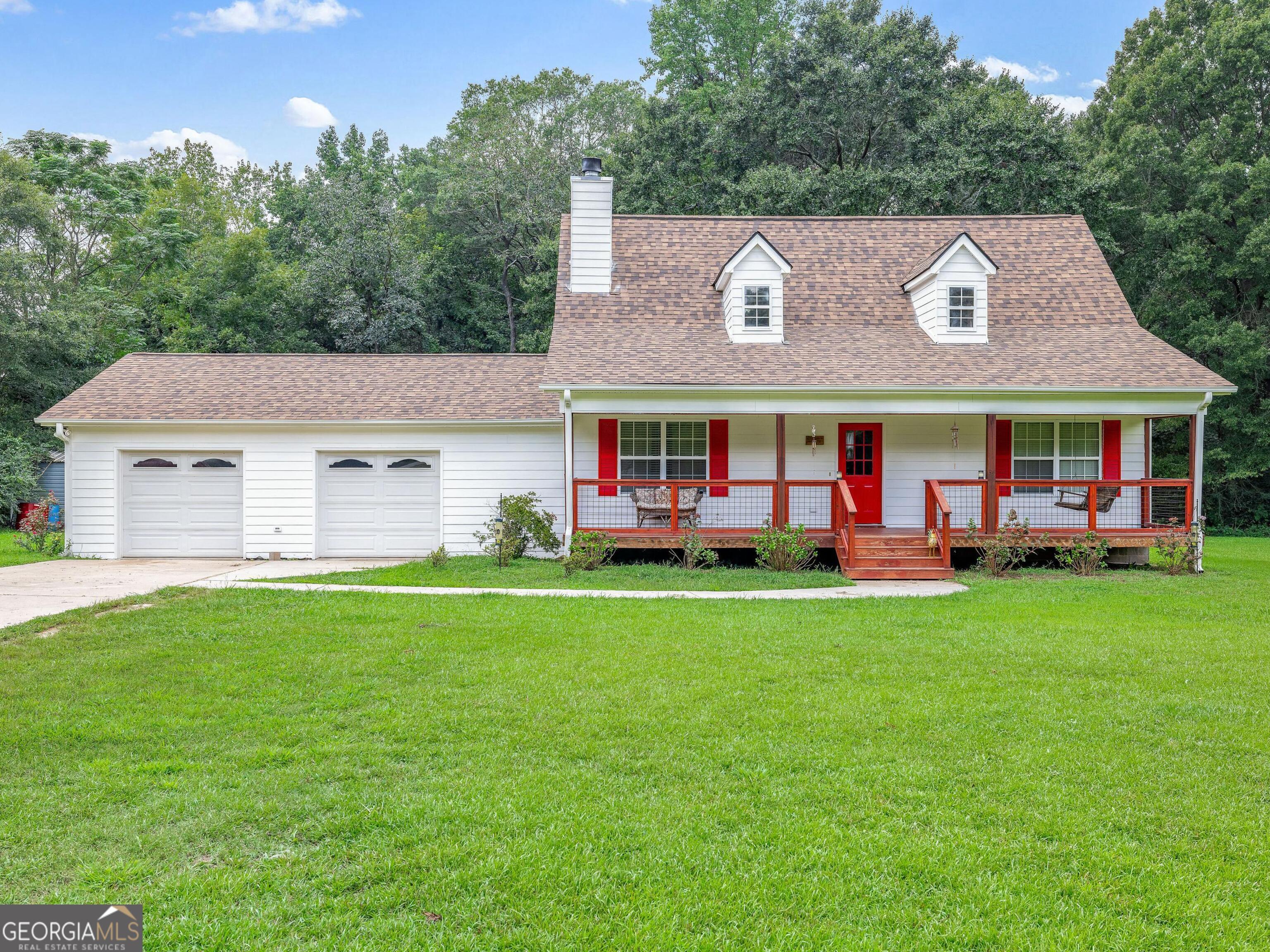 Charming 3-bedroom, 2-bath country home on 5 acres with a creek. Master on main level and 2 upper level bedrooms. This property boasts the peace and privacy of country living while keeping you close to all the conveniences Madison County has to offer. Property has large, flat front yard which is ideal for kids, pets, or outdoor entertaining. Home features deck on back which is prefect for watching wildlife. Don't miss out on this unique opportunity.