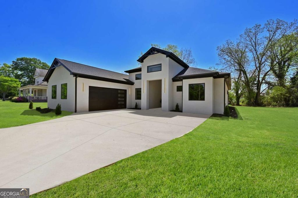 Photo of 6183 Redan Road, Lithonia, GA 30058 (MLS # 10730400)