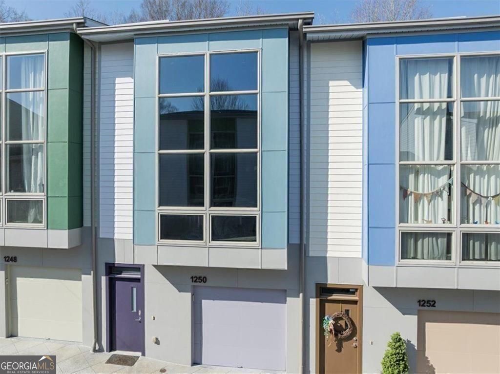 Photo of 1250 Breuer Mews MEWS NW, Atlanta, GA 30318 (MLS # 10785591)