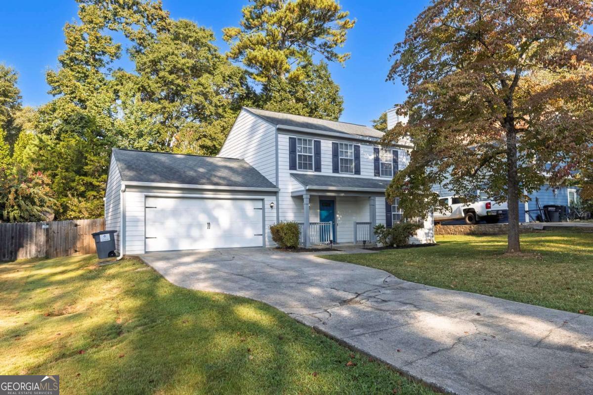 Welcome to 2987 Carrie Farm Rd NW - a beautifully updated home nestled in the established Carrie Farms neighborhood with no HOA! This charming property sits on a level lot with a fully fenced backyard, perfect for pets, play, or peaceful outdoor relaxation. Enjoy mornings on the patio and evenings by the cozy gas fireplace in the family room. Inside, you'll find a bright and airy layout featuring a modern kitchen with stunning quartz countertops, a marble tile backsplash, and stainless steel appliances-ready for your culinary adventures. Every detail has been thoughtfully upgraded, making this home truly move-in ready. Located just minutes from Kennesaw State University, I-75, shopping, and dining, this home offers convenience, comfort, and lasting value. Whether you're a first-time buyer, downsizing, or investing, this is a rare opportunity you don't want to miss!