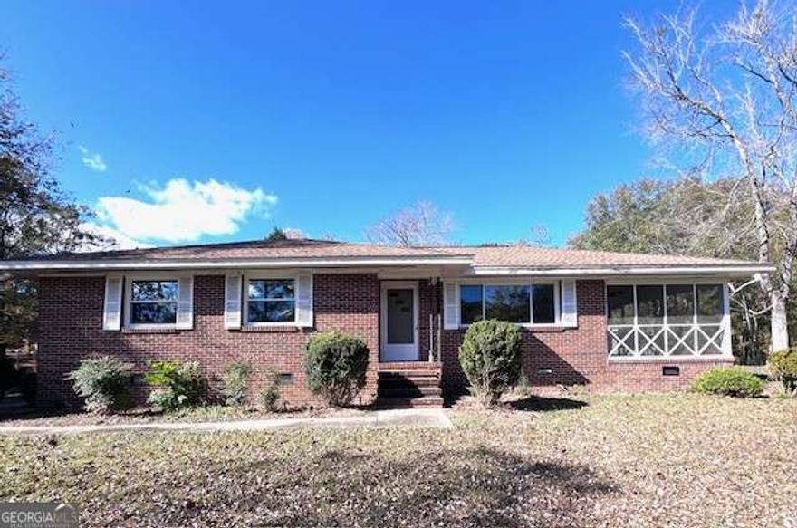 Discover timeless elegance in this beautifully updated 3-bedroom, 1.5-bath brick residence. New granite countertops/ backsplash in newly constructed kitchen- new SS appliances. The inviting screened porch and spacious living room offer serene views of the pond, creating the perfect blend of comfort and sophistication. As you walk on the brand new LVP floors you will notice the colors of the old century wood shine its lavish look. Nestled at the end of a long private drive, this four-sided brick home rests on approximately 5.14 acres of pristine grounds and includes three well-appointed storage buildings.